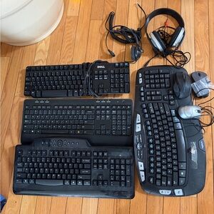 Dell and Logitech Keyboards with Accessories